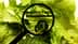 Magnifying glass focusing on nutrition facts label on leafy greens background. - Olive Oil Times