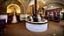 Interior view of an olive oil mill featuring traditional production equipment and machinery. - Olive Oil Times