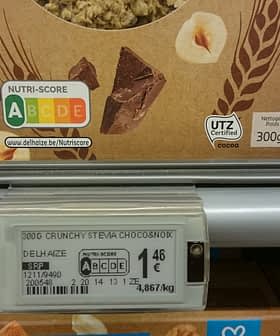 Product label for 300g Crunchy Chocolate Snack displayed in a grocery store. - Olive Oil Times